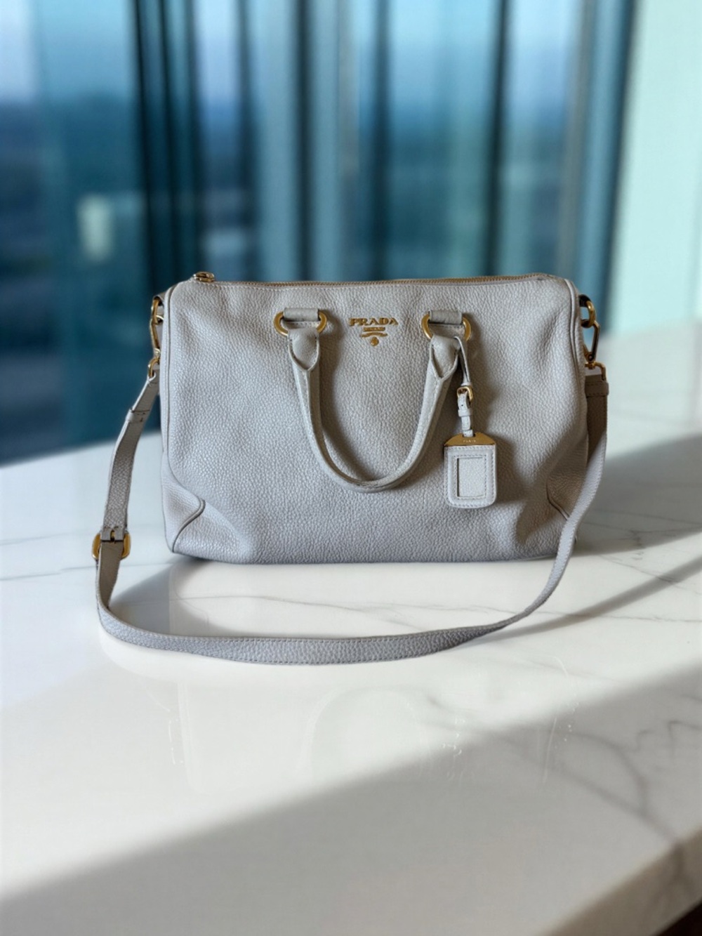 Prada Light Gray Pebbled Leather Satchel with Adjustable Strap